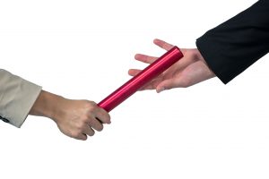 64510111 - business people passing a baton on white background 4k